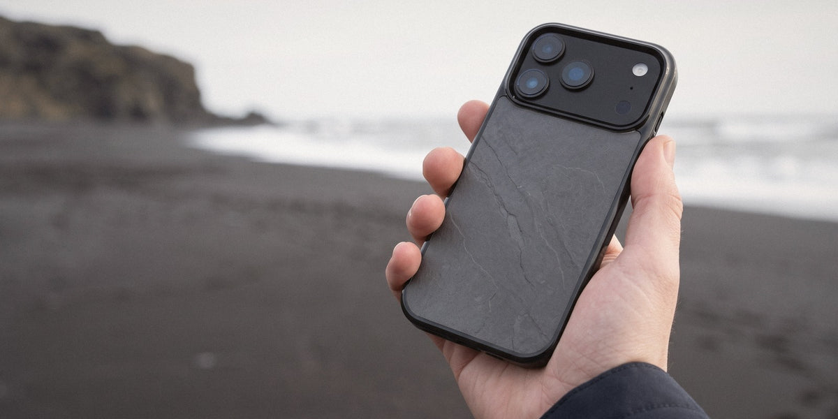 Onyx stone iPhone case on a black-sand beach